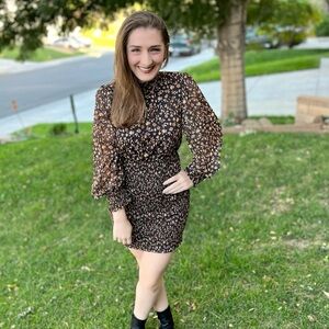 Perfect fall dress🍁 Black floral smocked long sleeve mini dress. Gently used!